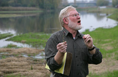 Principal Environmental Scientist at Terrestrial Environmental Specialists, Inc. Joseph McMullen conducts a site tour and explains how the use of different water zones will inhibit the growth of invasive non-native plant species.