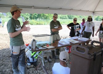 Ryan Davis, Principal Scientist, Anchor QEA, answers questions from volunteers about monitoring of wetland habitats.