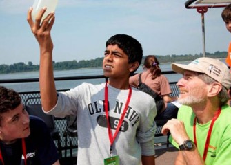 Dr. Peter Plumley and Honeywell Summer Science Week Students Examine the Water Quality of Onondaga Lake.