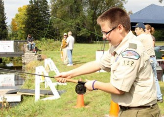 Boy Scout Seth Ormsby Tries his Hand at Fly Fishing.