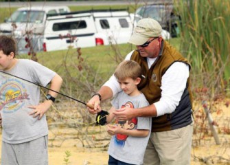 Young Sportsmen Receive Lessons from a Trout Fly Fishing Instructor.