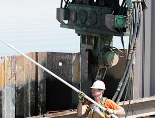 Worker Checks Installation Progress