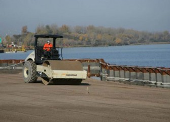 Grading work continues along the shoreline next to Phase II of the Barrier Wall.