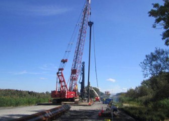 Phase III of the barrier wall continues near Harbor Brook.