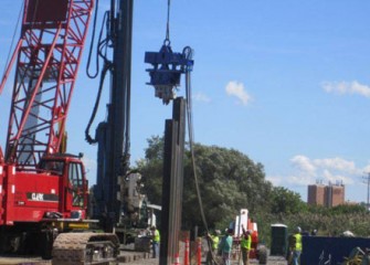 The vibratory hammer being positioned.