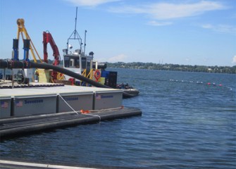 The pipeline section which will be used to transport material from the lake to the first booster pump is marked with buoys.