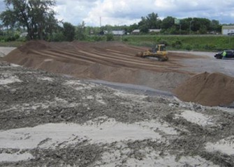 Capping material is stockpiled before operations begin.