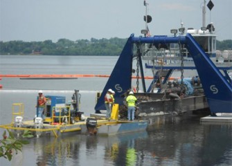 Routine inspections and maintenance are performed on dredge cutter heads.
