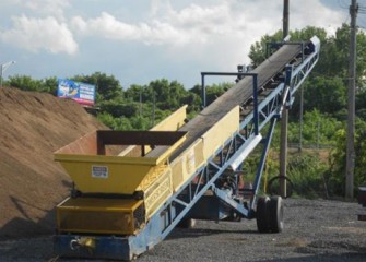 Weigh belt to measure sand before mixing with carbon.