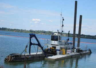 Medium-sized dredge on Onondaga Lake.