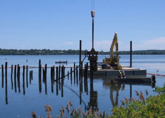 The first debris removed consists mostly of old wood pilings