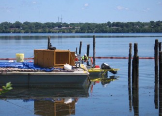 Power is supplied to the vibratory hammer by a generator on a support barge