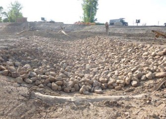 Cobblestones are added to enhance underwater habitat conditions