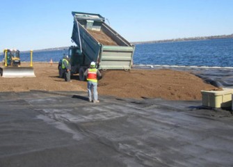 Clean dirt is placed over the groundwater collection system.