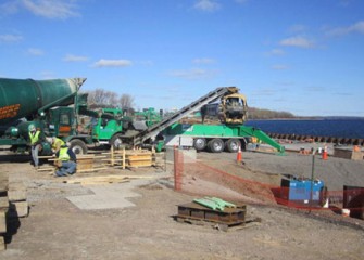 Concrete pad to hold equipment for lake operations.