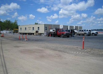 The trailers are aligned to form a single office building