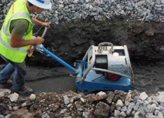 Worker prepares for utilities to be installed