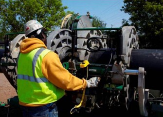 Sections of pipe are welded together in the field to form the approximate four-mile-long pipeline.