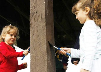 Abby and Lauren Searle Paint the Pavillion at Reed Webster Park