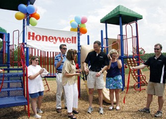 Camillus Town Supervisor Mary Ann Coogan and McAuliffe Cut the Celebratory Ribbon