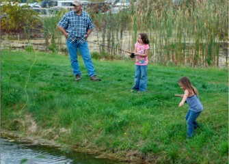 Gwena Aubin (middle) and Ariana Davis (right) Learn Fly Fishing Techniques from a Pro