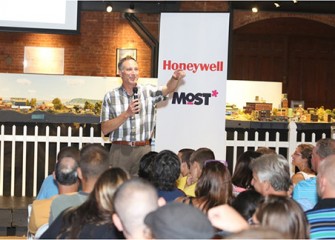 Honeywell Program Director John McAuliffe asks students what they learned during Honeywell Summer Science Week at the MOST