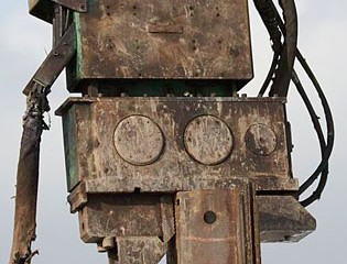 Vibratory Hammer Atop Steel Panel