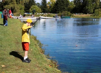 Participants enjoyed a variety of outdoor activities at the 2012 Honeywell Sportsmen's Days at Carpenter's Brook. Above: Connor Moore, of Camillus, N.Y., fishes for trout.