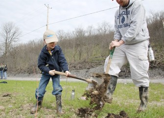 Volunteers of all ages join in planting.