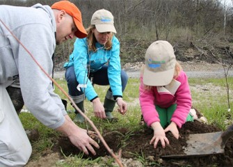 Onondaga Lake Conservation Corps members get their hands dirty.