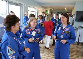 Pattie Burns (center) and Sue Bingham (right), alumnae, meet Linda Trippany, a 2013 Honeywell Educator, before a recognition event at the Onondaga Lake Visitors Center.
