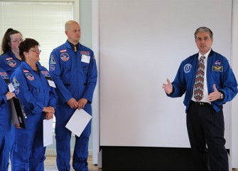 Former NASA Astronaut Donald Thomas, Ph.D., acknowledges the accomplishments of the new Honeywell Educators, who will learn new innovative teaching techniques in science, technology, engineering and math at Space Camp.