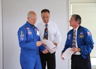 John McAuliffe and Don Thomas congratulate David Amidon, 8th grade Science Teacher at LaFayette Junior-Senior High School.