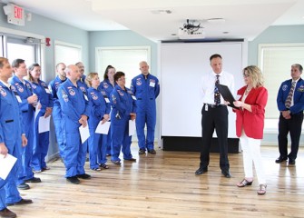 Onondaga County Legislator Judy Tassone, whose district includes Onondaga Lake,  reads a Proclamation from County Executive Joanne M. Mahoney declaring May 29, 2013 Honeywell Educators @ Space Academy day in Onondaga County.