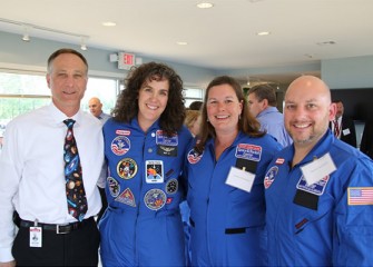 From left:  Syracuse Program Director John McAuliffe and Honeywell Educators @ Space Academy alumna Becky Loy with 2013 Academy members Pamela Herrington (East Syracuse Minoa Central High School) and David Chizzonite (Chittenango Middle School).