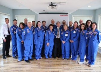 Central New York Honeywell Educators @ Space Academy alumni and the 2013 class with Honeywell Syracuse Program Director John McAuliffe and former NASA astronaut Donald Thomas (center).