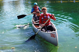 Participants enjoyed a variety of outdoor activities at the 2013 Honeywell Sportsmen's Days at Carpenter's Brook. Above: Marcus Landers (front), Donavan Lynn (center), and Quentin Lynn, all of Syracuse, N.Y., canoe.