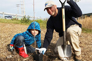 "This is my second time volunteering for the Corps and today I brought my son with me," said David Amidon, Corps member, science teacher in the LaFayette Central School District, and an alumnus of Honeywell Educators @ Space Academy. "We just planted a red oak that he named. I want him to be able to come back for years and say, 'I planted that!'"