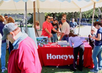 People at Honeywell’s booth learn how improvements at Geddes Brook and Nine Mile Creek are helping support a diversity of returning wildlife.