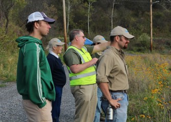 Onondaga Lake Conservation Corps volunteers also view an area of Nine Mile Creek wetlands planted in 2012.