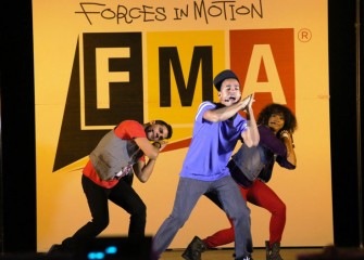 FMA Live! uses hip-hop, larger-than-life demonstrations, and audience participation to teach middle school students the basic principles of physics. From left are professional actors Eric Olson, John “J.J.” James, and Sharmaine Tate.