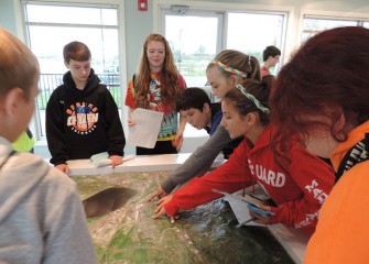 Students use the displays to learn about Onondaga Lake’s watershed.