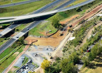 Cleanup work continues on lower Nine Mile Creek. A booster pump station for the dredge pipeline is seen bottom left.