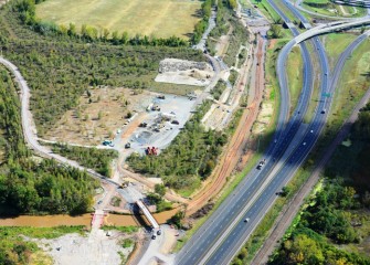 Nine Mile Creek will become part of a green corridor connecting Onondaga Lake to important upland habitat. Onondaga County’s bridge connecting the recreation trail is visible.