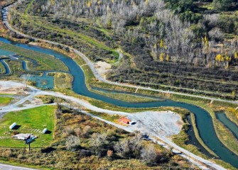 This section of Nine Mile Creek, near Geddes Brook, has been cleaned, realigned and graded to create floodplains and wetlands. Native trees, shrubs, flowers and grasses were planted to restore healthy habitat around the creek.