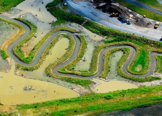 During high water, the redesigned Geddes Brook overflows to fill adjacent wetland areas.