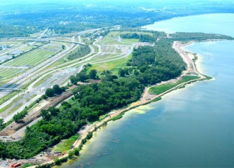 Installation of a groundwater collection system continues along the Western Shoreline. Construction access roads can be seen along the lakeshore. Up to 9.5 acres of new wetlands will be planted starting in 2014.