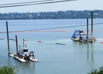 Three hydraulic dredges, operating at different times, are used to remove lake material. The two largest dredges are seen here.