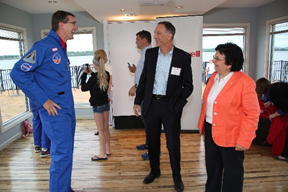 John McAuliffe speaks with Christopher Ludden (left) and Donna DeSiato, Ed.D., East Syracuse Minoa Central School District superintendent (right).