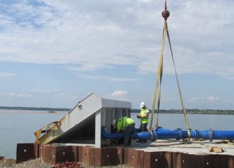 Assembly begins on a third hydraulic capping barge.